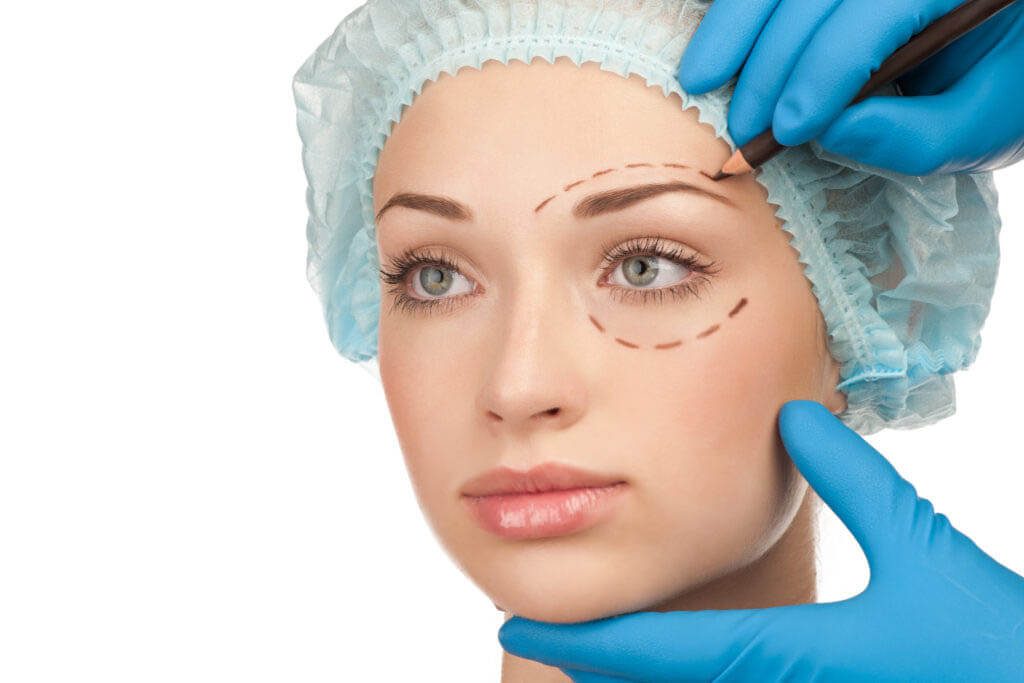 Surgeon performing Blepharoplasty Treatment in Delhi, demonstrating the surgical technique to rejuvenate the eyelids by removing excess skin and fat.