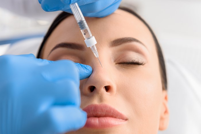 Dr. Adarsh Tripathi expert liquid rhinoplasty in Delhi